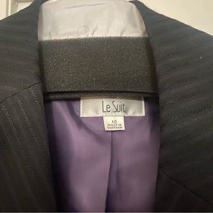 Pant suit, black with purple stripe.